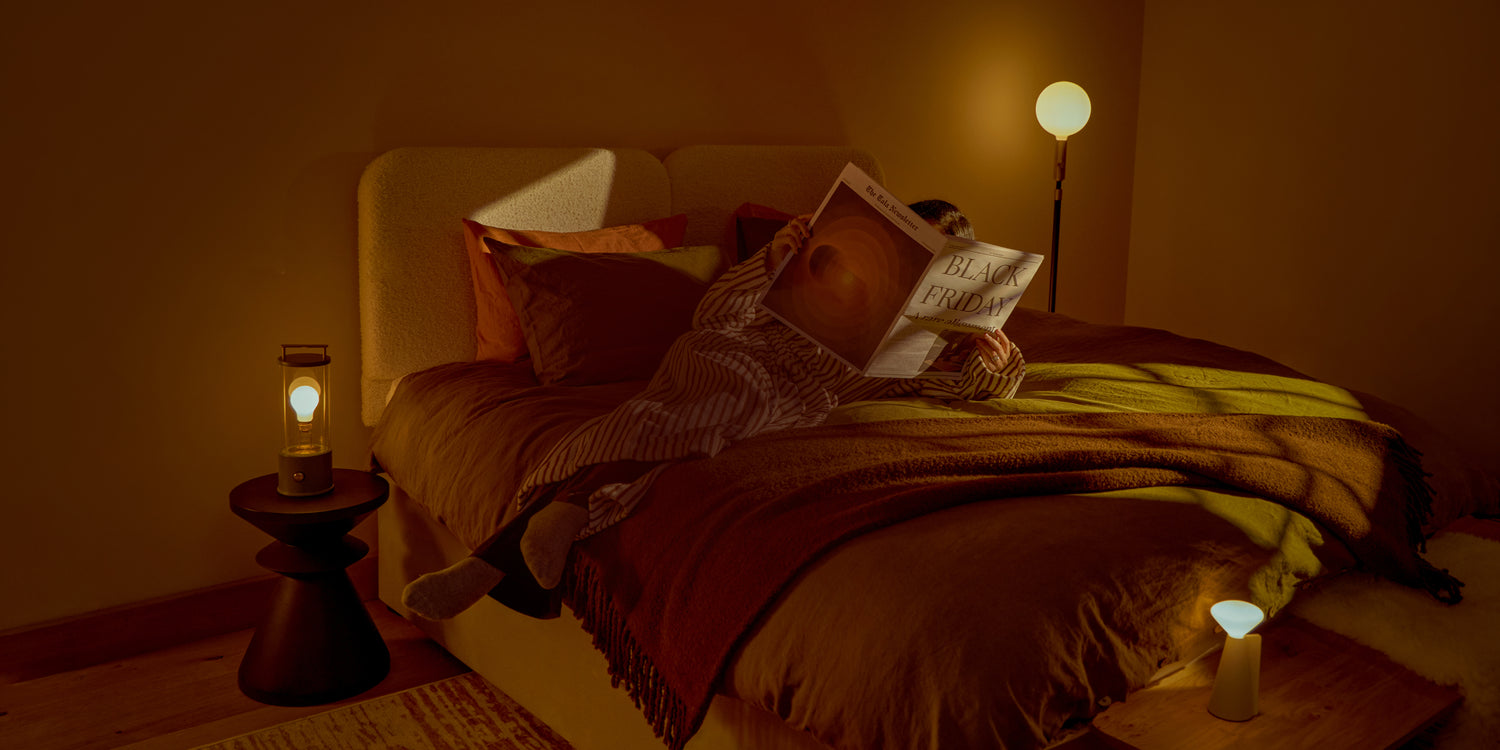 black friday lifestyle image featuring the poise floor lamp from tala