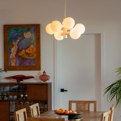Lifestyle photo of Echo Chandelier, one of Tala’s best-selling ceiling lights, adding elegance to any room.