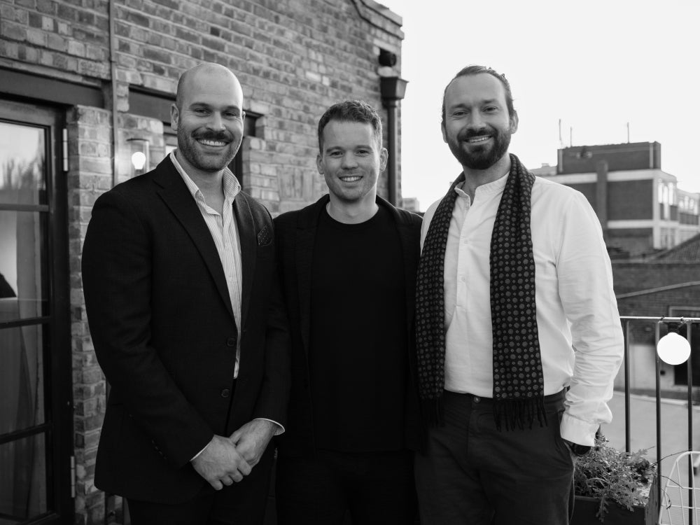 Tala founders Maxwell Wood, Joshua Ward, and William Symington outside Tala's London studio space.