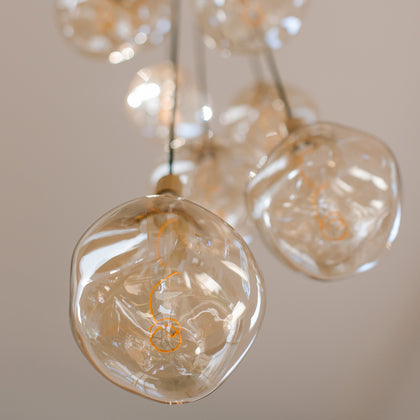 Lifestyle photo of Tala Voronoi Mouth-Blown Bulbs, one of our best-selling decorative bulbs.