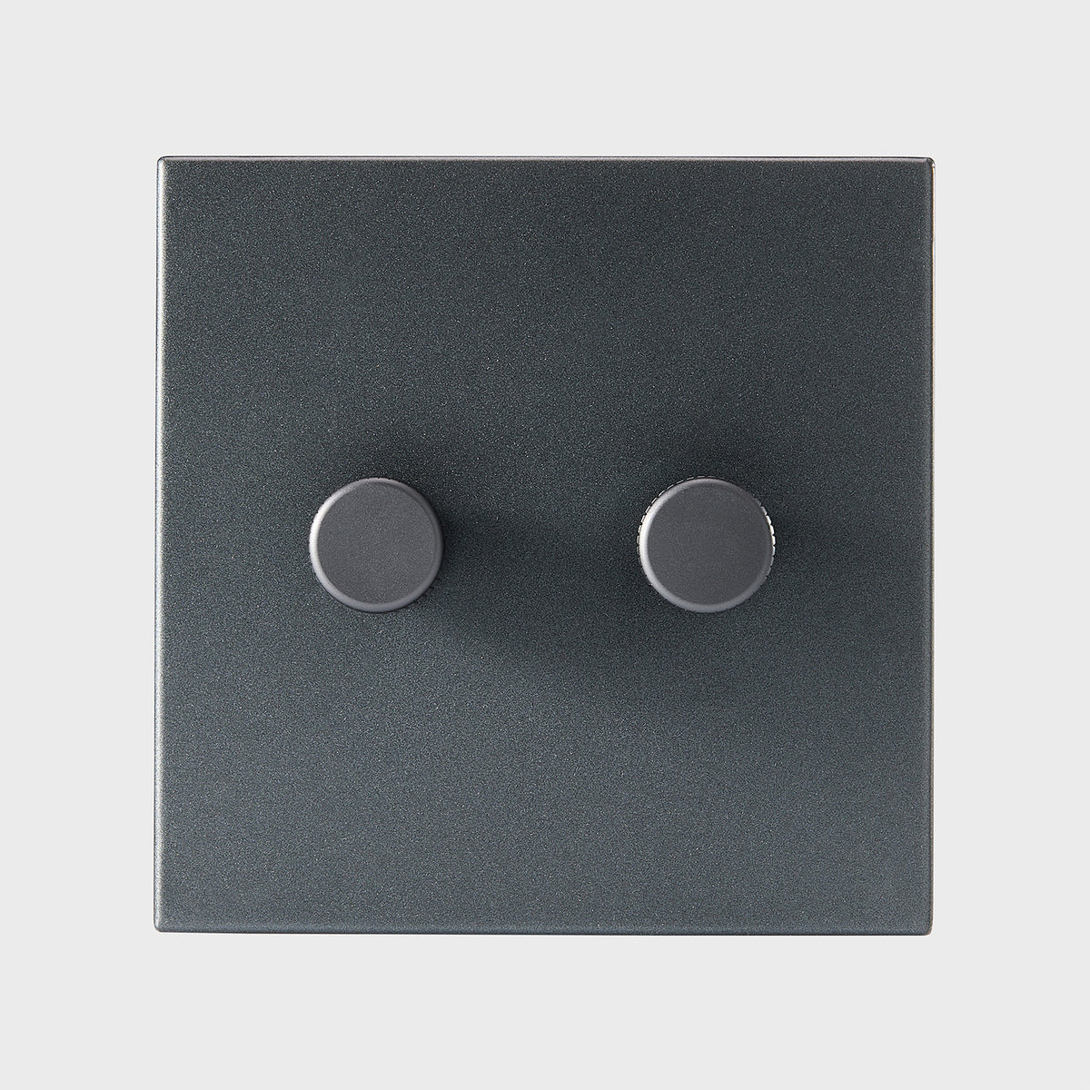 Detail shot of the Tala Double Rotary Dimmer in Graphite, showcasing its smooth control and refined design