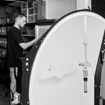 Tala Engineer Bertie Pleass Preparing  Lights for a Professional Photoshoot